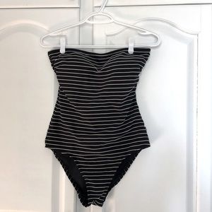 Black one piece swimsuit with white stripes